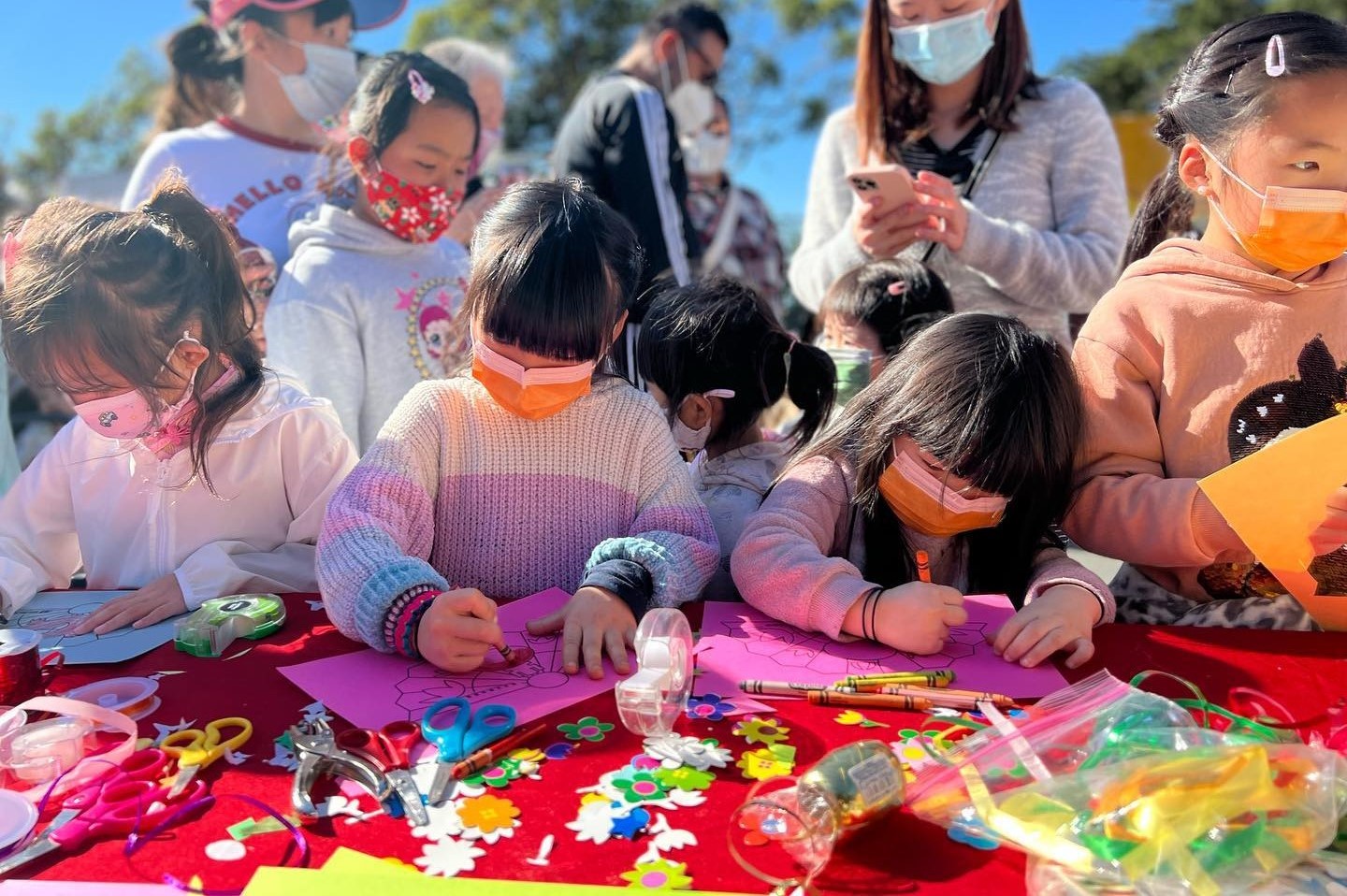 Children doing crafts at the SCCD Lunar New Year Event 2022