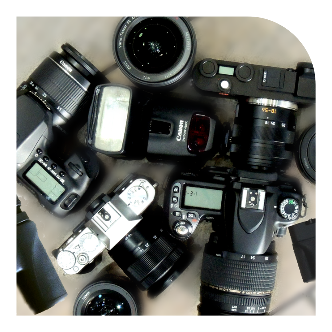 overhead photo of a collection of cameras