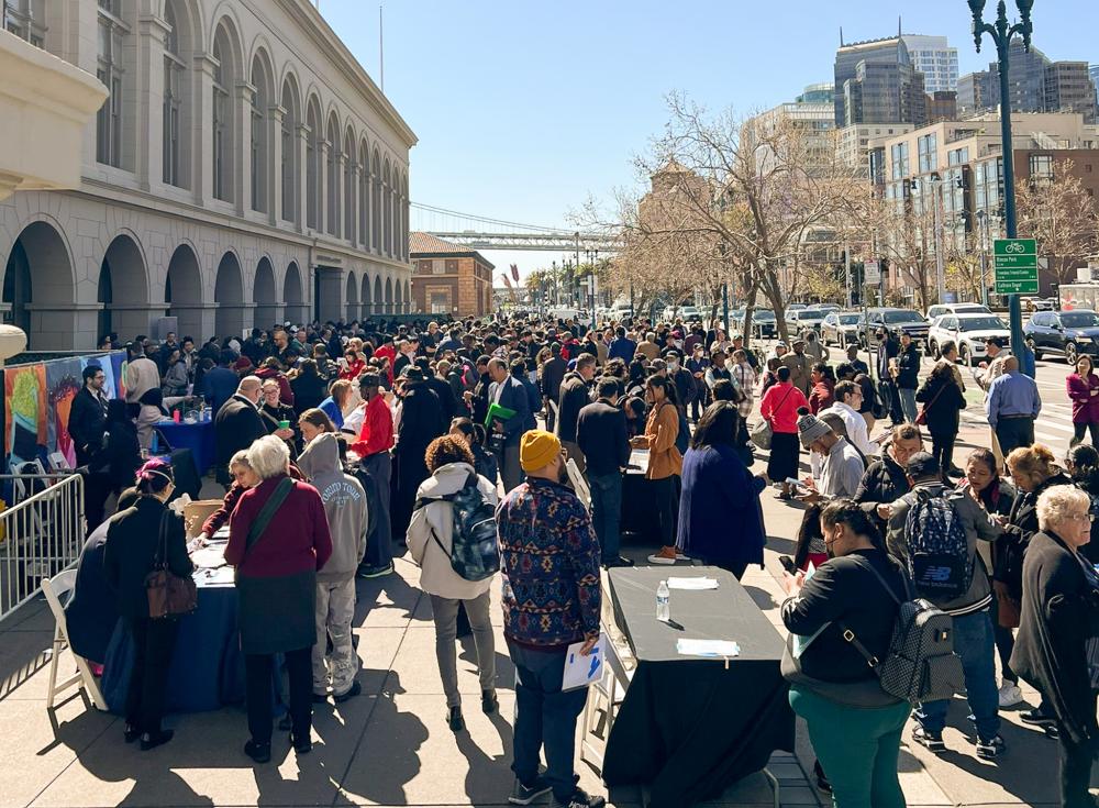 Hundreds of jobseekers attend a hiring fair at the Ferry Building